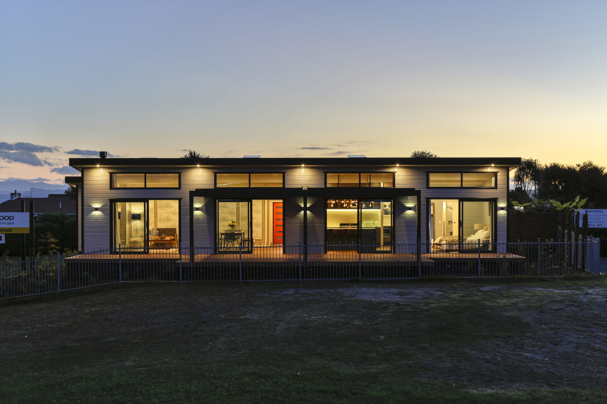 Lockwood Taupo with Textura Black joinery and white cladding