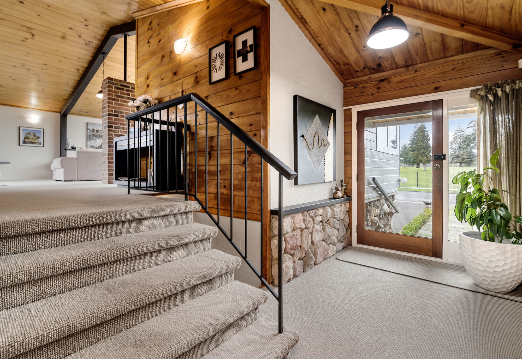 Stone and plasterboard feature wall in updated Lockwood home