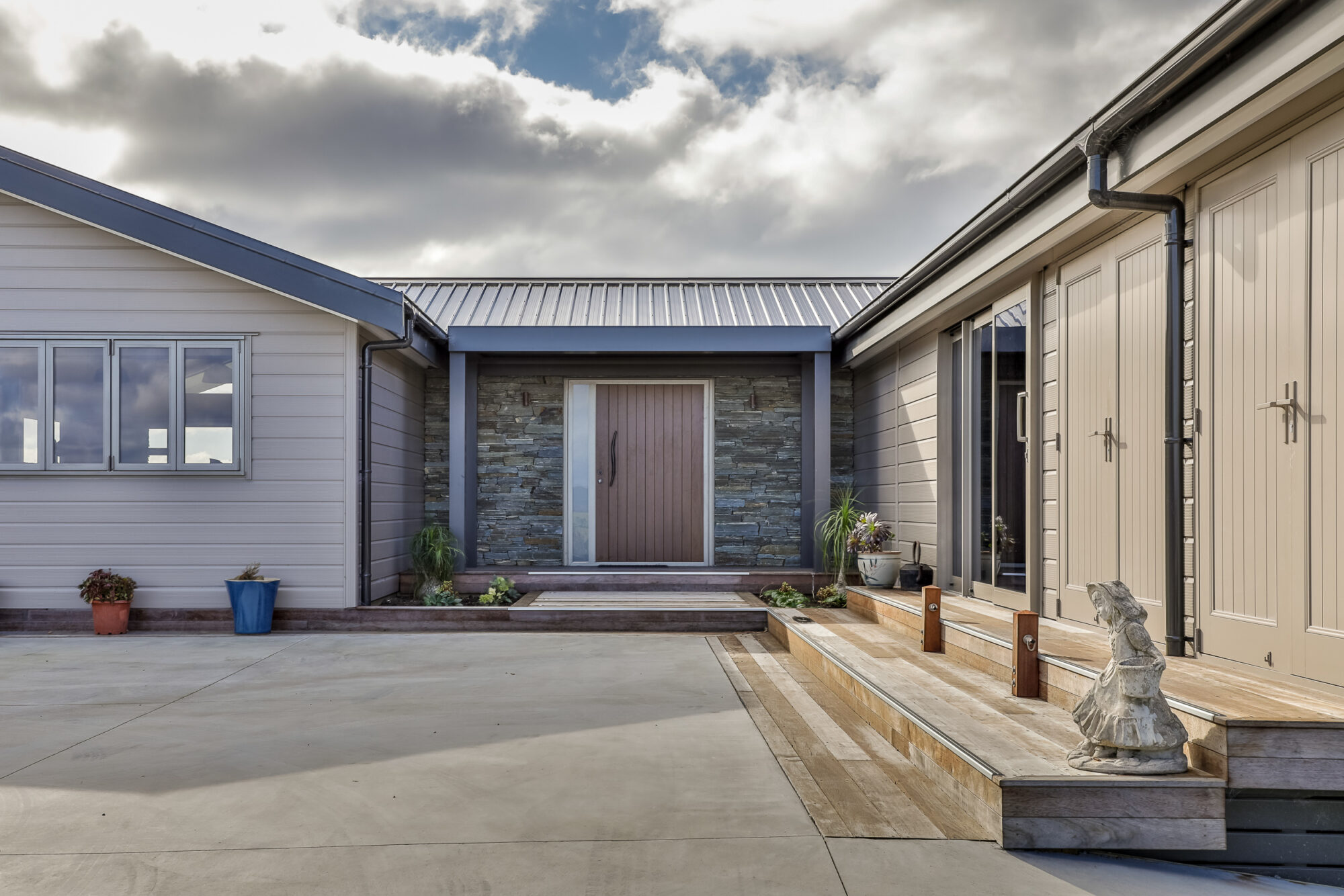 Inviting entryway with exceptional stone work